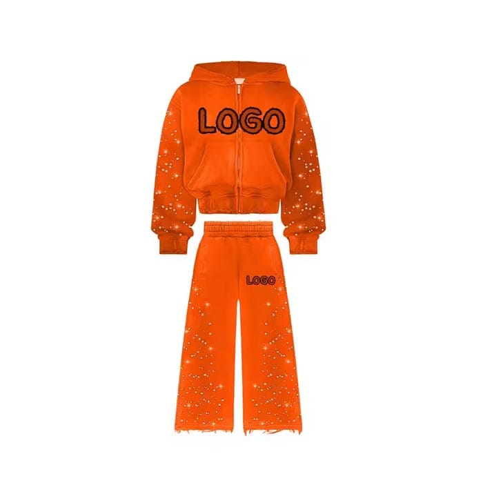 Custom hoodie and joggers with a sparkling rhinestone logo