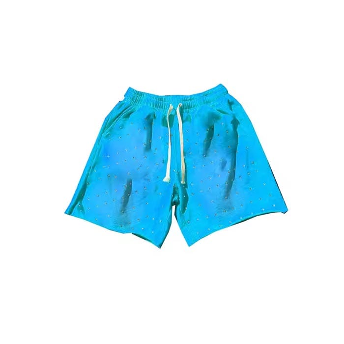 Custom rhinestone patchwork shorts with mixed fabric design and dazzling rhinestones
