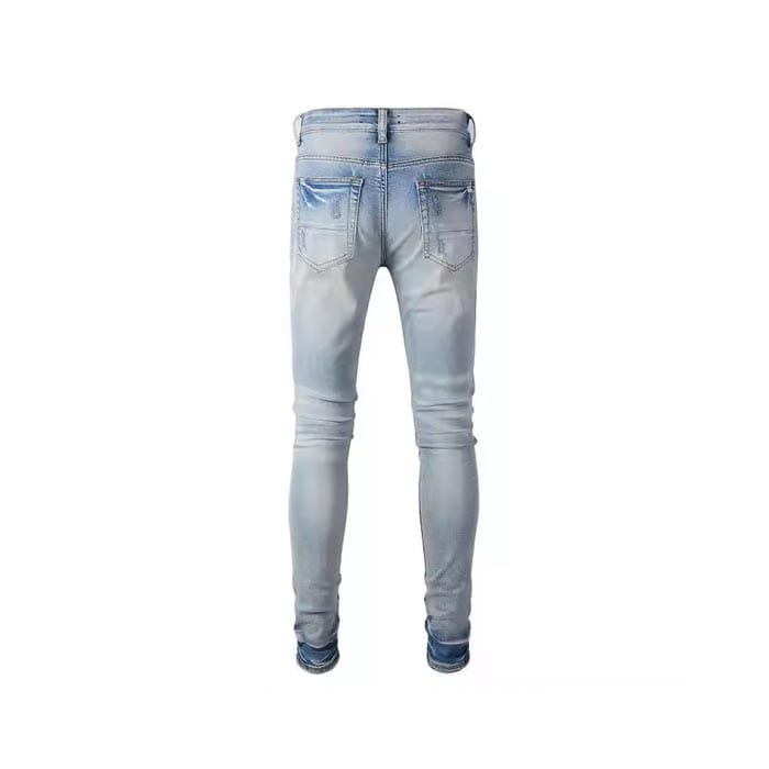 Custom ripped skinny jeans with distressed detailing, designed for modern fashion brands.
