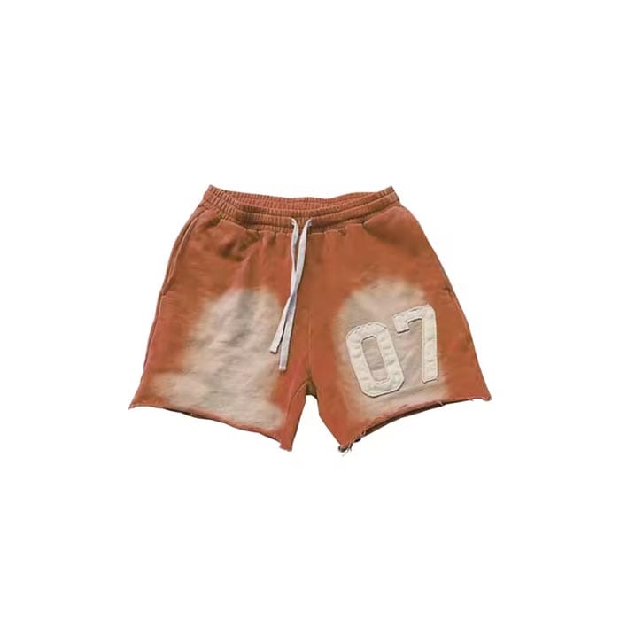 Custom sunfaded shorts with embroidered logo, vintage wash, and soft cotton blend