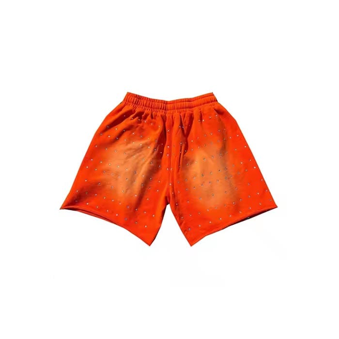 Custom vintage wash rhinestone shorts with distressed details and premium embellishments
