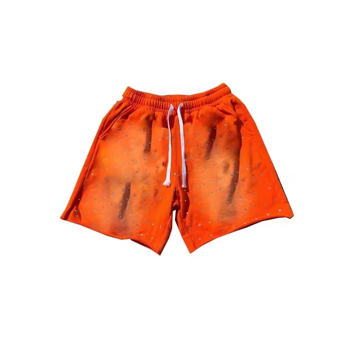 Custom vintage wash rhinestone shorts with distressed details and premium embellishments