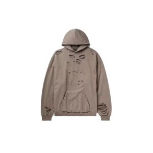 Oversized distressed hoodie with a baggy fit, raw edges, and relaxed streetwear style.
