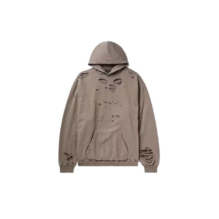 Oversized distressed hoodie with a baggy fit, raw edges, and relaxed streetwear style.