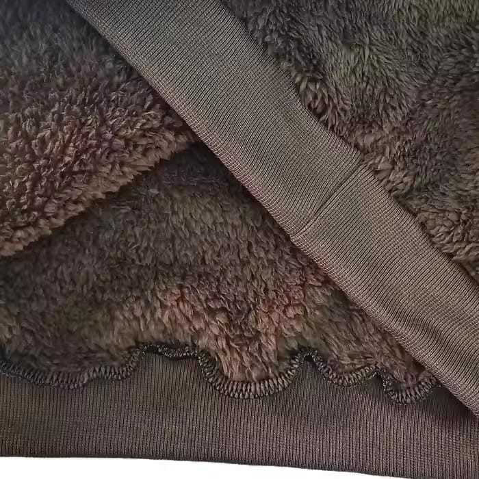 Sherpa fleece hoodie with deep pockets for warmth and convenience.