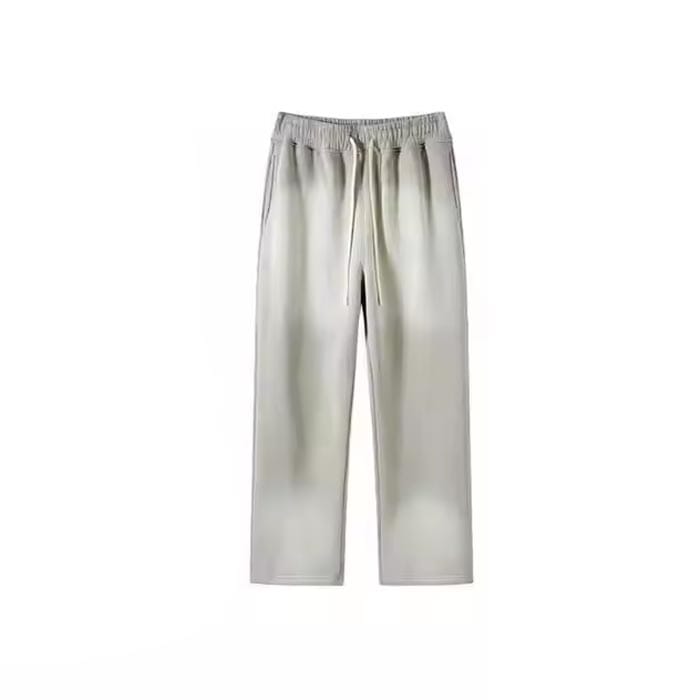 Sunfaded joggers with appliqué patches and vintage wash