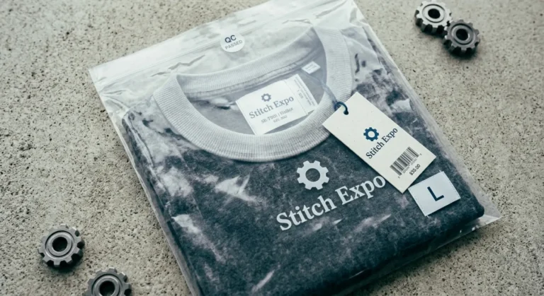 Private label t shirt packaging with custom tags and branded polybag