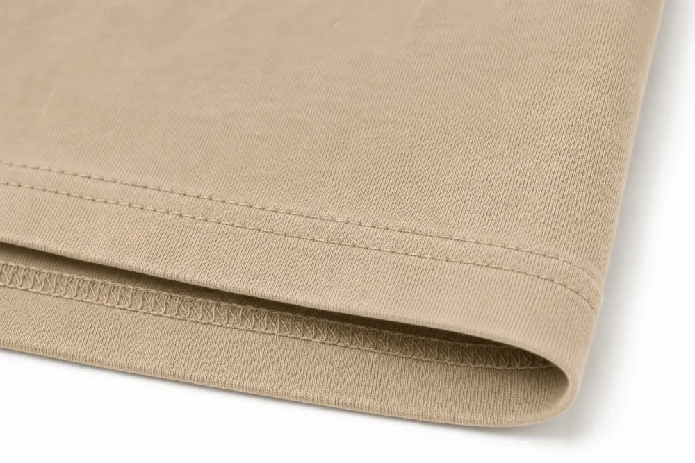 beige-oversized-tshirt-hem-closeup Closeup Hem Finish of Beige Oversized Heavyweight Cotton Boxy Fit T Shirt