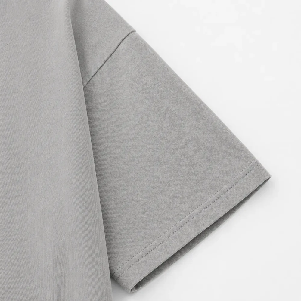 Closeup Sleeve Stitching of Grey Oversized Heavyweight Streetwear T Shirt