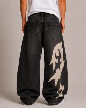 Appliqué graphic denim jeans back view