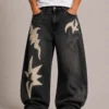 applique-graphic-denim-jeans-front Appliqué graphic denim jeans front view