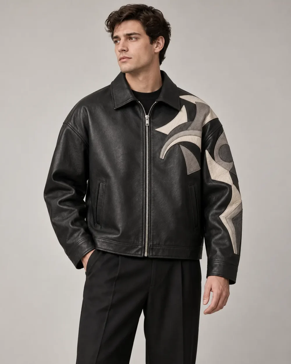 Appliqué graphic leather jacket front view