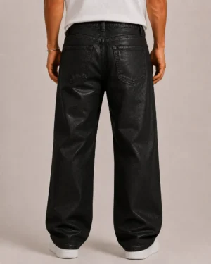 Black coated denim jeans back view