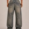 Dirty wash vintage jeans back view