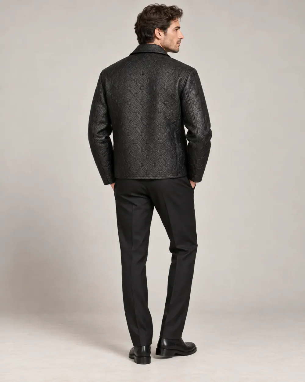 Embossed black leather jacket back view