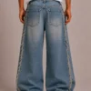 Frayed side seam baggy jeans back view
