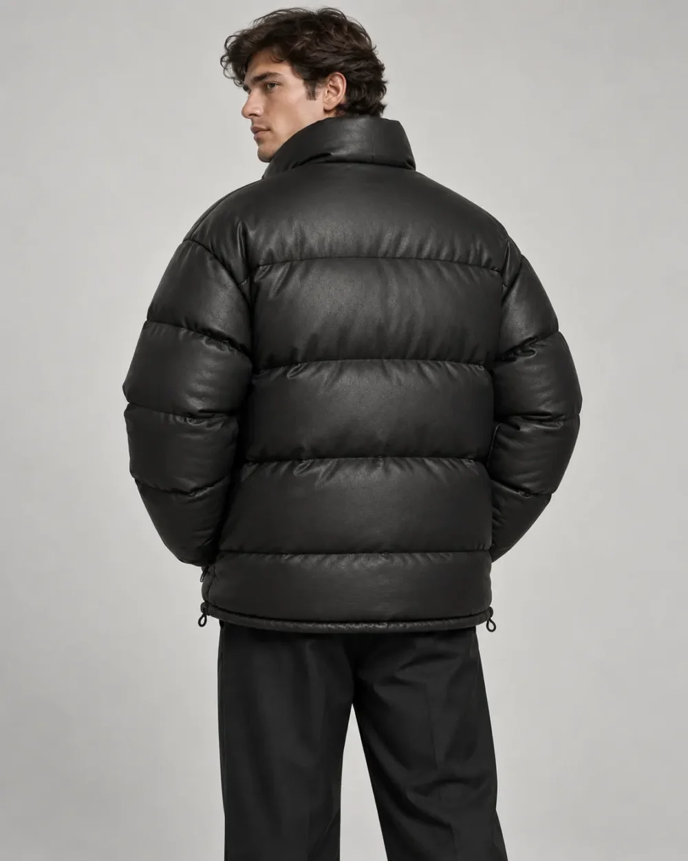 leather-puffer-jacket-back Oversized black leather puffer jacket back view