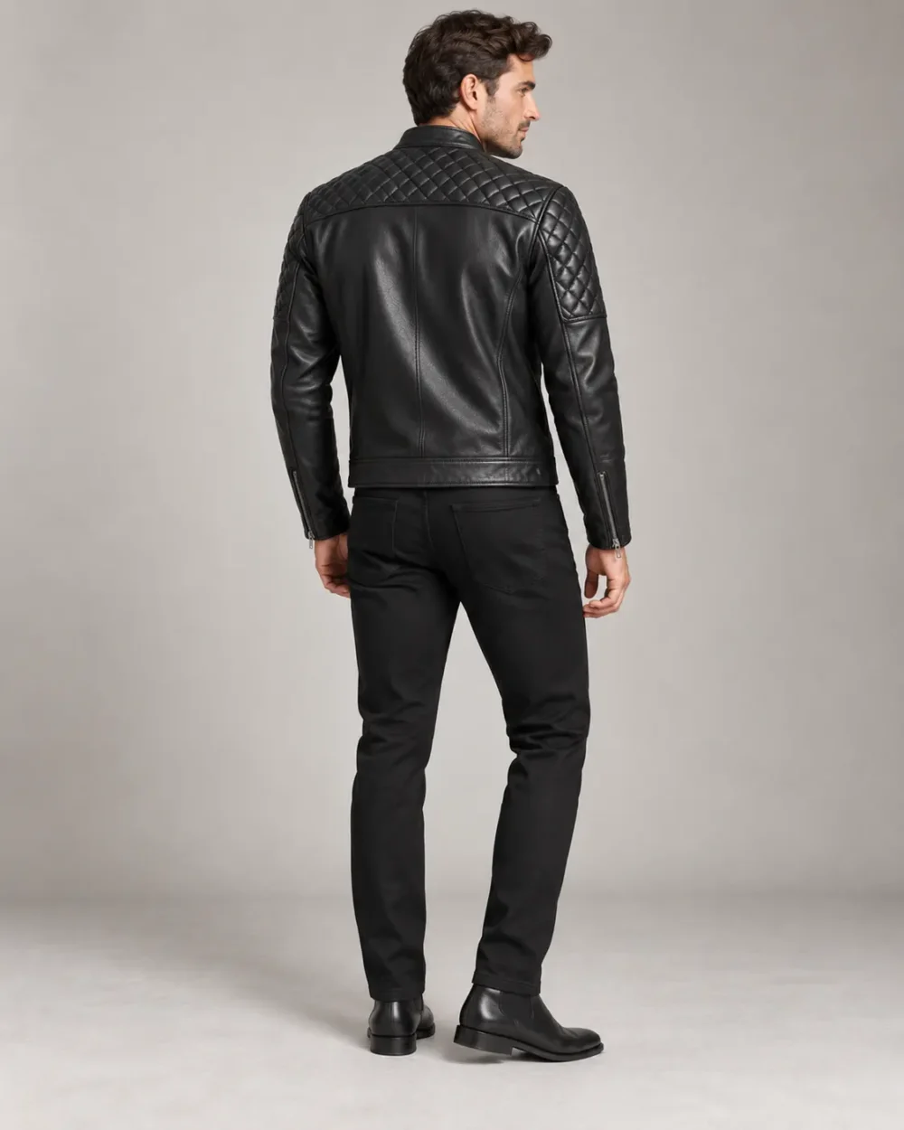 Black leather jacket with quilted shoulders back view