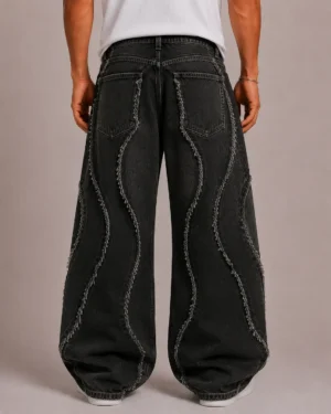 Raw edge panel jeans back view