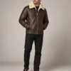 Brown leather jacket with cream shearling collar front view