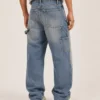stone-washed-carpenter-jeans-back Stone washed carpenter jeans back view with hammer loop