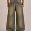 Tinted wash baggy jeans back view
